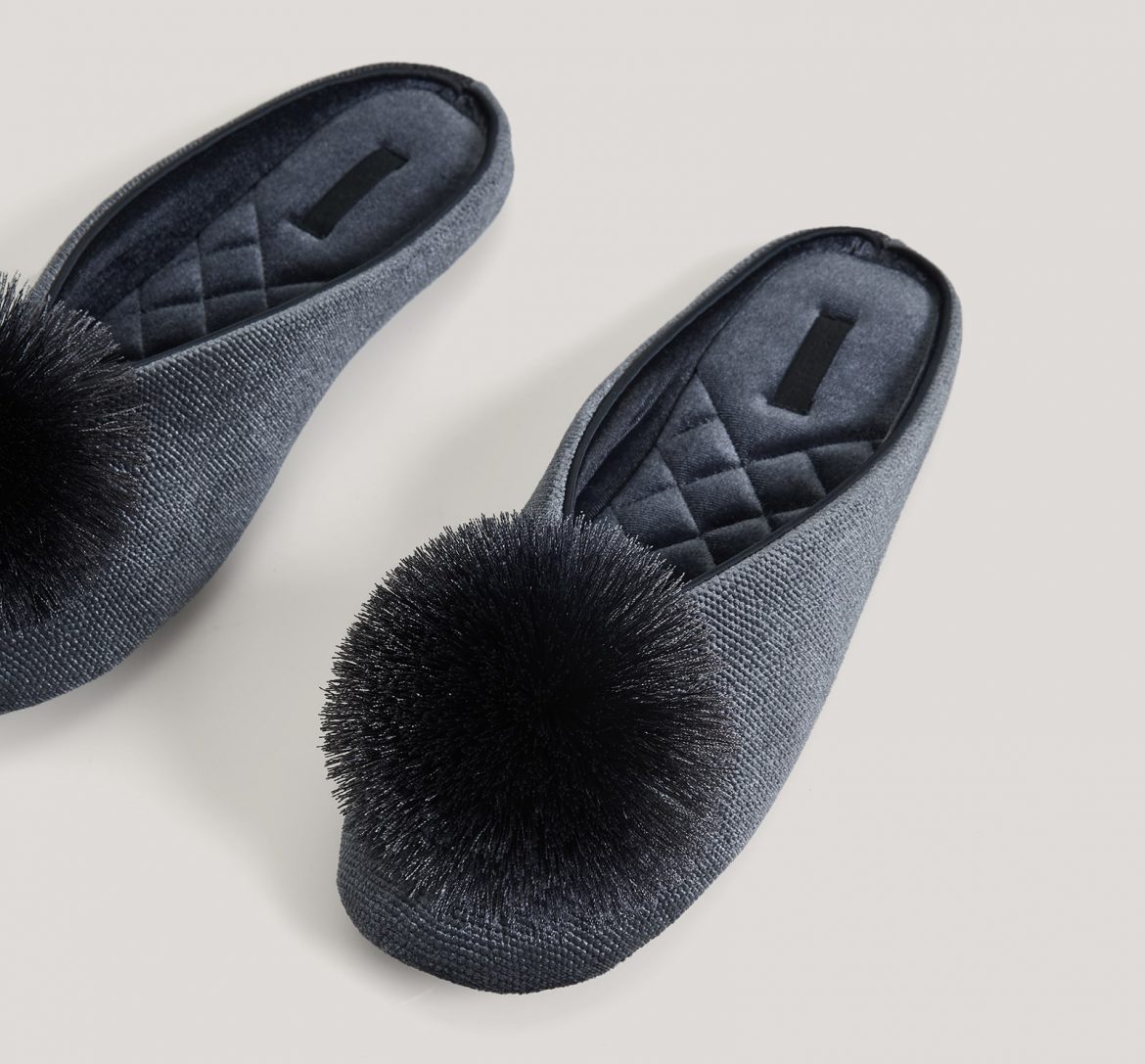 oysho grey slippers with pom poms | Esty Lingerie